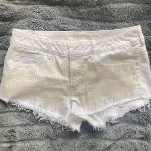 American Eagle sequin white cut off shorts
